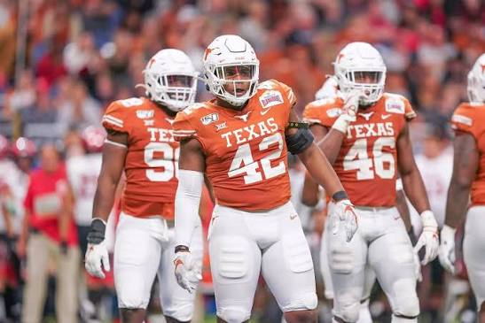 Marqez Bimage in a burnt-orange Texas Longhorns uniform, number 42, on the field at a game